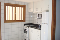 Cozinha mobiliada da kitnet.