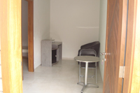 Sala mobiliada da kitnet.